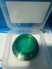 Coated focusing lens in protective case
